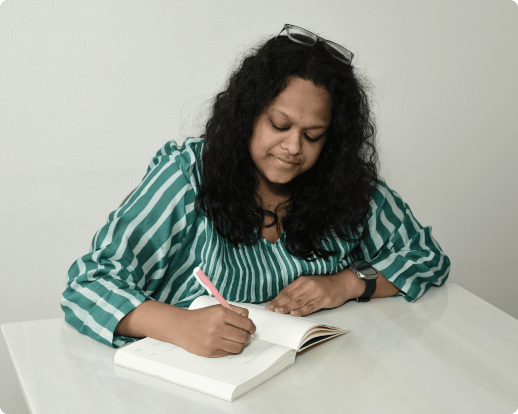 Women writing a notebook