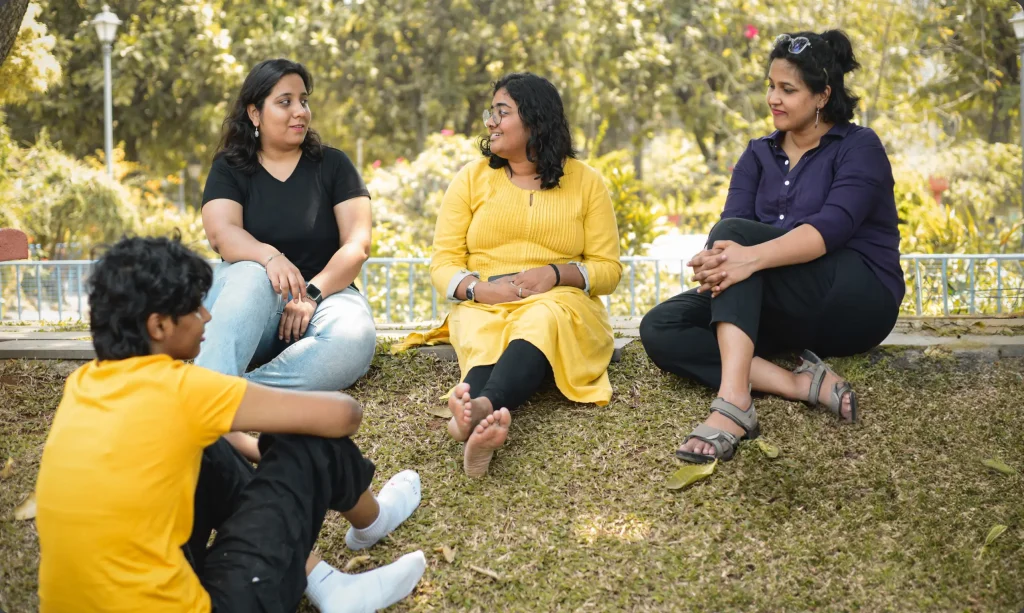 A group of 4 members spending time outdoor